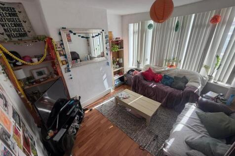 Bright lounge with ample seating and natural li...