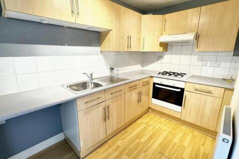 Modern fitted kitchen with ample storage space...