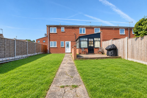 Sunny Suburban Garden with Conservatory.png