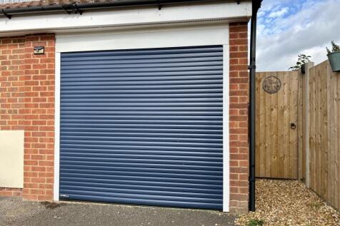 garage with electric roller door