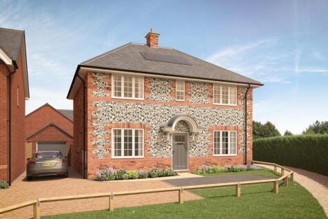A charming two-story brick house with a patterned exterior
