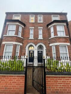 Attractive red-brick period property with twin ...