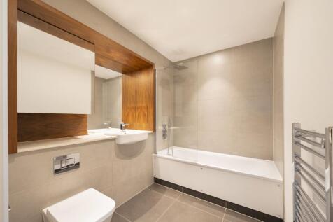 Experience luxury in this contemporary bathroom, crafted for relaxation and style.