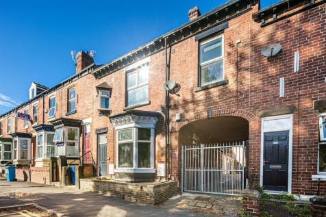 Charming red brick terrace under a blue sky...