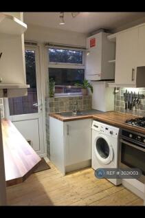Kitchen Leading To Decking And Back Garden 