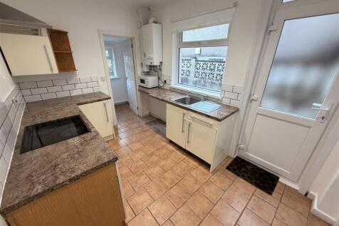 Bright kitchen with ample counter space...