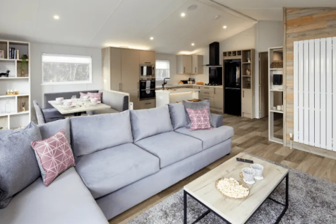 Spacious Open Plan Lounge With Grey Sofas And Mode