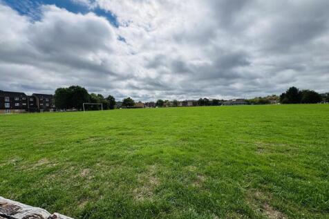 Park to the rear of the property