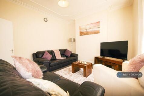 Large And Bright Living Room With Comfy Sofas