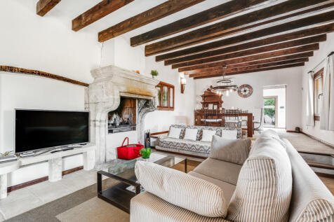 Living area with rustic fireplace