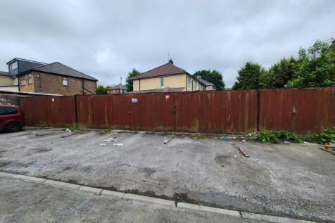 Plot of land in BD5 Conversion of eight garages t