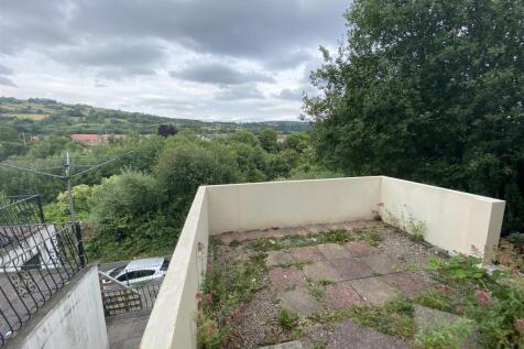 Private elevated terrace with scenic green view...