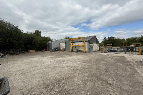 Commercial Property with  land just  under one ac