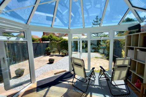 Conservatory to Outside Rear.jpg