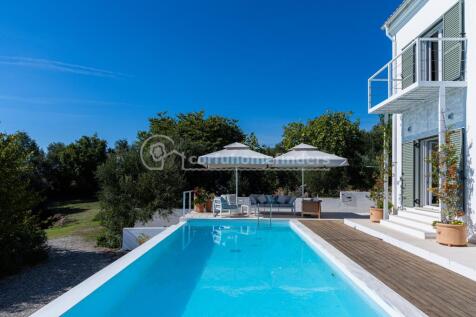 Pool and house