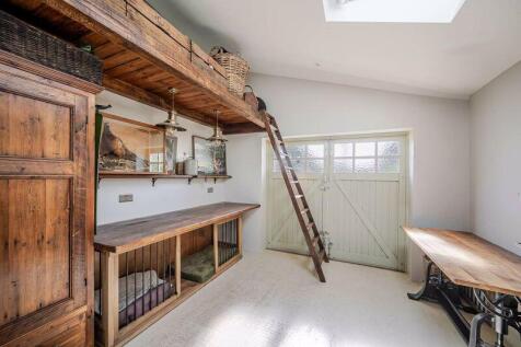 Integral garage currently used as dog...