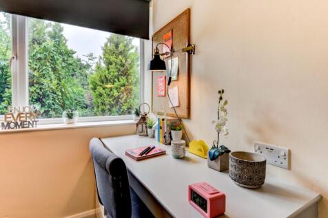 Bright study area with a lush garden view...