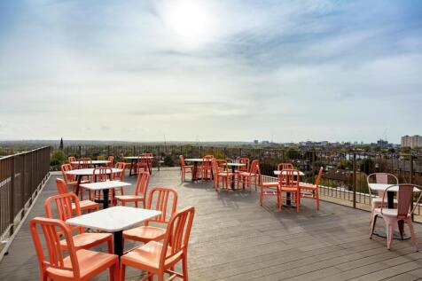 Spacious rooftop terrace with scenic city views...