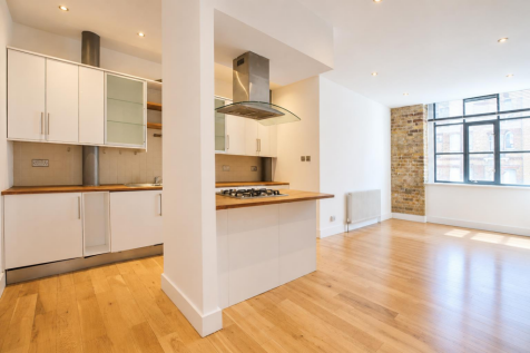 Empty Modern Kitchen and Living Space.png