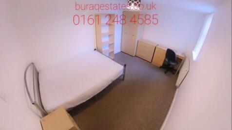 Bright, simply furnished double bedroom with a ...