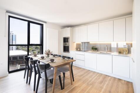 Experience stylish living with this elegantly designed kitchen and dining space.