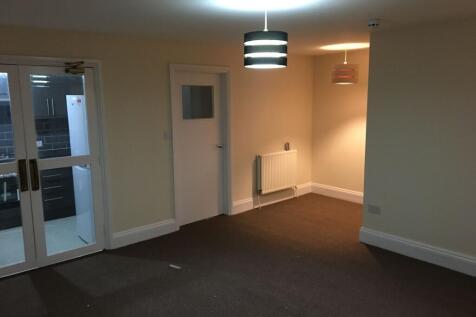 Well-presented living room with contemporary pe...