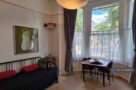 Tall Ceilings, Large Windows, Spacious Studio