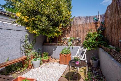 sunny private courtyard garden