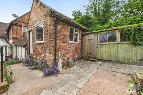 Outbuiding and rear of house - Charlotte Thomasson