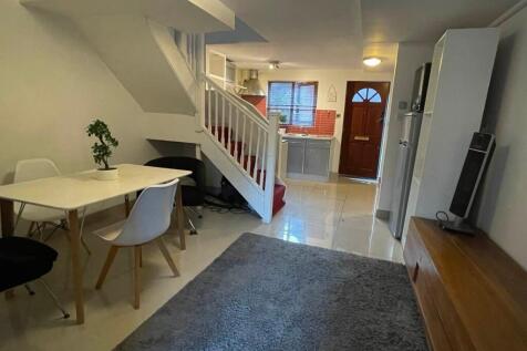 A warm and inviting living area featuring a mod...