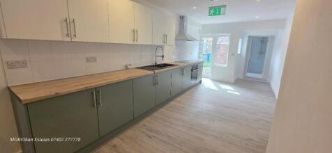Bright kitchen with modern cabinets and space....