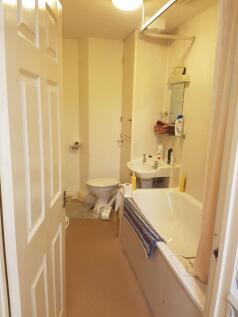 Bright bathroom with bath and basin...
