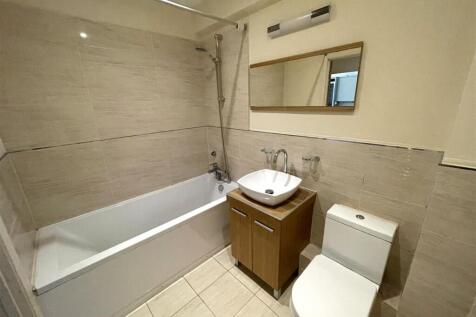 Bathroom offering shower over bath