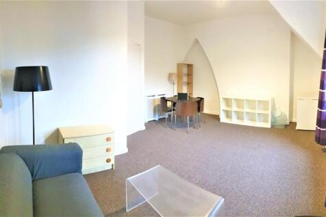 Bright, spacious lounge with stylish arch detai...