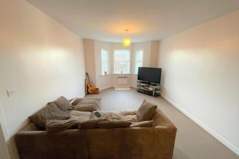 LOUNGE WITH KITCHEN AREA