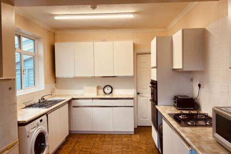 Bright, well-kept kitchen with generous counter...