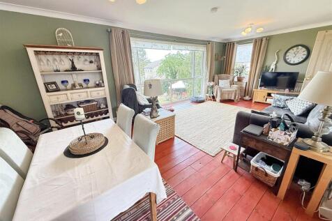 L Shaped Lounge through Dining Room