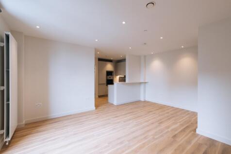 Step into sophistication with this spacious open-plan apartment, perfect for contemporary living.