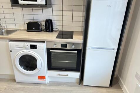 Modern kitchen with high-end appliances...