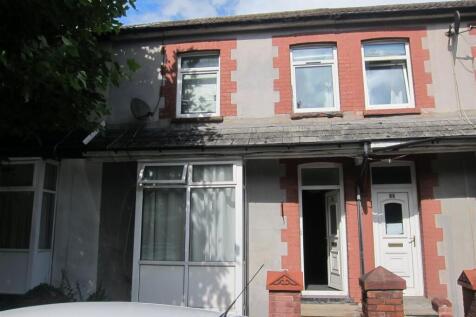 Charming terraced home with classic red brick...