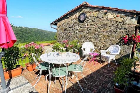 Charming outdoor terrace with garden views, ideal 