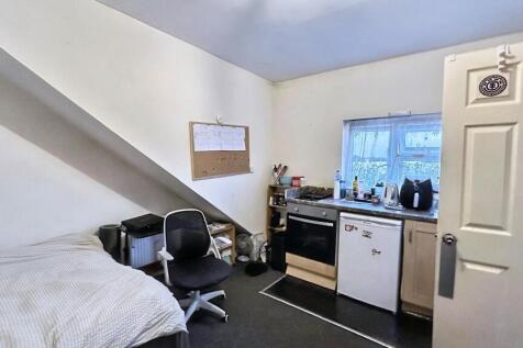 Bright studio space with modern appliances....