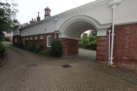 Grand historic entrance with elegant archway...