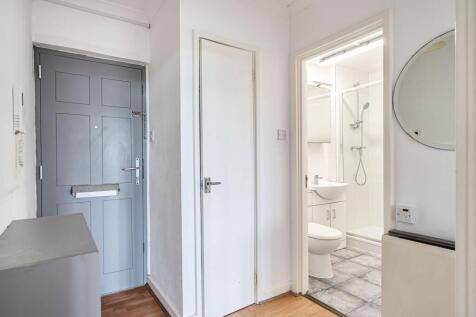 Step through the door into a bright hallway