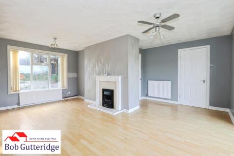 "L" SHAPED LOUNGE / DINING ROOM