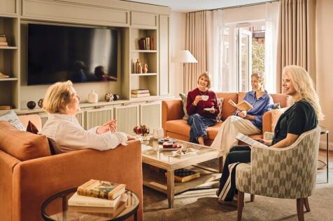 a group of people sitting on a couch