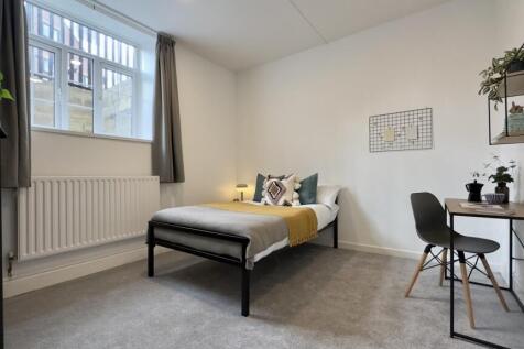 A stylish and inviting double bedroom with good...