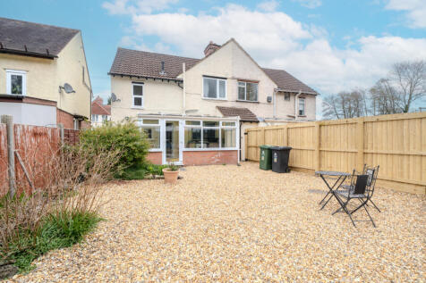 A family home that is strolling distance to Town.