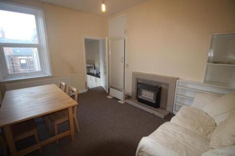 Bright and inviting living room featuring a coz...