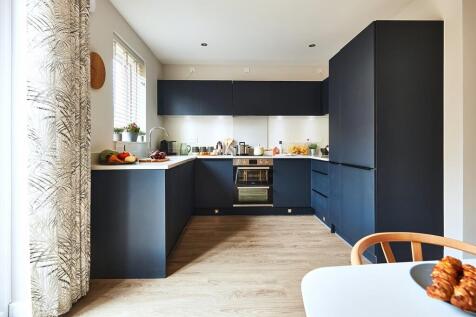 Enjoy a bright kitchen with patio doors to access the rear garden